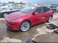 2026 Tesla Model Y — photo 2 of 14 | VIN 7SAYGDEE8TA386196