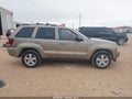 2005 Jeep Grand Cherokee — photo 13 of 16 | VIN 1J4GS48K15C524344