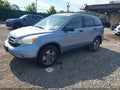 2011 Honda CR-V — photo 2 of 16 | VIN 5J6RE4H3XBL065478