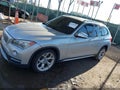 2013 BMW X1 — photo 14 of 17 | VIN WBAVM5C53DVV89954