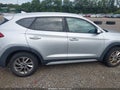 2018 Hyundai Tucson — photo 13 of 17 | VIN KM8J3CA40JU670717