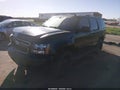 2013 Chevrolet Tahoe — photo 2 of 17 | VIN 1GNSKBE0XDR330941