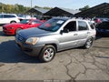 2007 Kia Sportage — photo 2 of 16 | VIN KNDJF723277317220