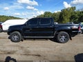 2014 Toyota Tacoma — photo 14 of 16 | VIN 3TMJU4GN2EM157647