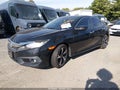 2017 Honda Civic — photo 2 of 12 | VIN 2HGFC1F91HH638022