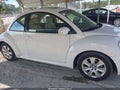 2010 Volkswagen Beetle — photo 13 of 16 | VIN 3VWRW3AG1AM011815