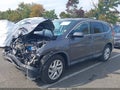 2016 Honda CR-V — photo 2 of 16 | VIN 2HKRM4H51GH704417