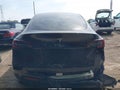 2024 Tesla Model Y — photo 16 of 18 | VIN 7SAYGDED2RF202597