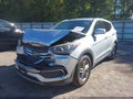 2018 Hyundai Santa Fe — photo 2 of 16 | VIN 5XYZT3LB6JG563157