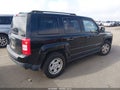 2014 Jeep Patriot — photo 4 of 13 | VIN 1C4NJPBB7ED813698