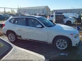 2013 BMW X1 — photo 13 of 16 | VIN WBAVL1C54DVR82163
