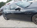 2015 Maserati Ghibli — photo 13 of 16 | VIN ZAM57XSA8F1144345