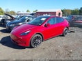 2021 Tesla Model Y — photo 2 of 18 | VIN 5YJYGDEF8MF297920