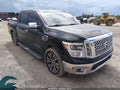 2017 Nissan Titan — photo 1 of 22 | VIN 1N6AA1E62HN564829