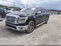 2017 Nissan Titan — photo 2 of 22 | VIN 1N6AA1E62HN564829
