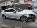 2018 Audi A5 — photo 13 of 16 | VIN WAUENCF57JA128711