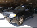 2007 Ford Escape — photo 2 of 14 | VIN 1FMYU03177KA33924