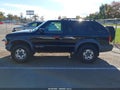2005 Chevrolet Blazer — photo 14 of 16 | VIN 1GNCT18X05K110318