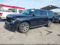 2018 Chevrolet Suburban — photo 2 of 18 | VIN 1GNSKHKC8JR213453
