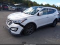2014 Hyundai Santa Fe — photo 2 of 14 | VIN 5XYZUDLB1EG217297