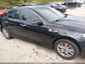 2018 Kia Optima — photo 13 of 16 | VIN 5XXGT4L3XJG235329