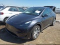 2024 Tesla Model Y — photo 2 of 16 | VIN 7SAYGDEE9RA249244