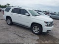 2015 Chevrolet Tahoe — photo 1 of 16 | VIN 1GNSCAKC2FR706203