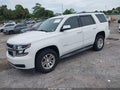 2015 Chevrolet Tahoe — photo 2 of 16 | VIN 1GNSCAKC2FR706203