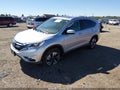 2016 Honda CR-V — photo 2 of 16 | VIN 5J6RM4H94GL105603