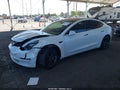 2017 Tesla Model 3 — photo 2 of 15 | VIN 5YJ3E1EA4HF001574