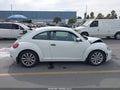 2017 Volkswagen Beetle — photo 13 of 16 | VIN 3VWF17AT9HM624720