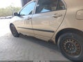 2004 Toyota Corolla — photo 12 of 15 | VIN 2T1BR32E04C169083