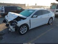 2022 Chevrolet Malibu — photo 2 of 15 | VIN 1G1ZD5ST3NF115916
