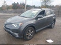 2018 Toyota RAV4 — photo 2 of 17 | VIN 2T3RFREV3JW838678