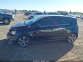2015 Chevrolet Sonic — photo 14 of 16 | VIN 1G1JG6SB6F4158810