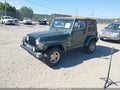1999 Jeep Wrangler — photo 2 of 12 | VIN 1J4FY49S7XP490270
