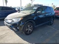 2018 Toyota RAV4 — photo 2 of 17 | VIN 2T3WFREV7JW490158