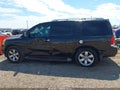 2013 Nissan Armada — photo 14 of 16 | VIN 5N1BA0ND1DN601472