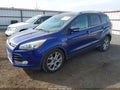 2015 Ford Escape — photo 2 of 11 | VIN 1FMCU9J9XFUB38578