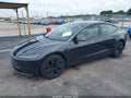 2025 Tesla Model 3 — photo 2 of 14 | VIN 5YJ3E1EA4SF033660