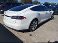 2014 Tesla Model S — photo 4 of 21 | VIN 5YJSA1H12EFP30543