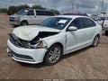 2018 Volkswagen Jetta — photo 2 of 16 | VIN 3VW2B7AJXJM227761