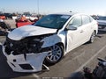 2016 Nissan Sentra — photo 2 of 16 | VIN 3N1AB7AP6GY298656