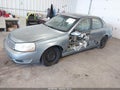 2003 Saturn L-Series — photo 2 of 15 | VIN 1G8JU54F03Y507470