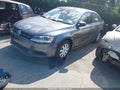 2013 Volkswagen Jetta — photo 2 of 11 | VIN 3VW2K7AJ8DM202295