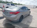2013 Hyundai Elantra — photo 4 of 11 | VIN KMHDH4AE9DU930632