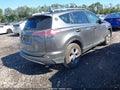 2018 Toyota RAV4 Hybrid — photo 4 of 17 | VIN JTMRJREV2JD203124