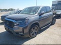 2022 Honda Ridgeline — photo 2 of 19 | VIN 5FPYK3F70NB012460