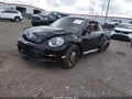 2014 Volkswagen Beetle — photo 2 of 17 | VIN 3VWJ07AT6EM661703