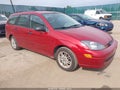 2003 Ford Focus — photo 1 of 11 | VIN 1FAHP36333W237459